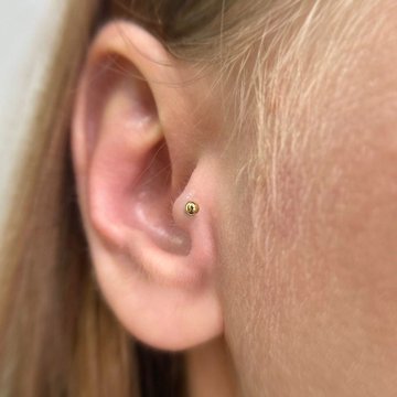 Tragus pīrsings